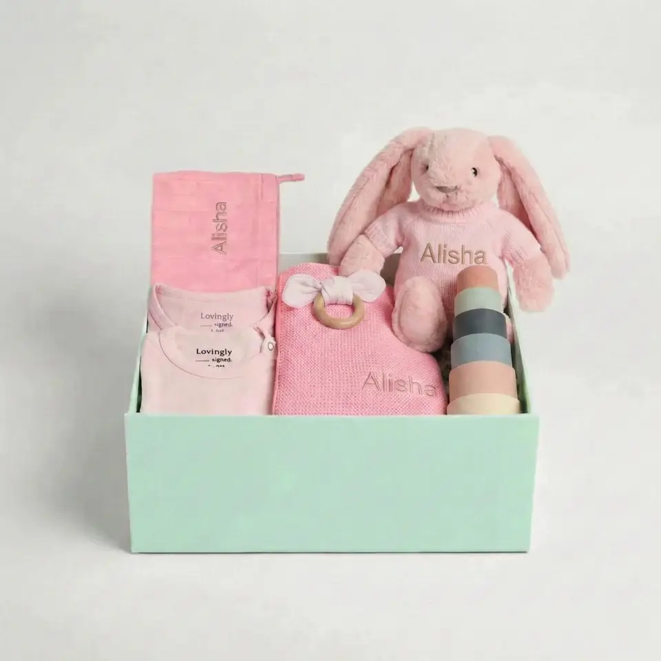 Embroidered baby clothes in a gift set
